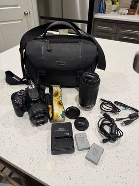 Nikon Black DSLR Camera Kit with Black Bag and Black Telephoto Lens